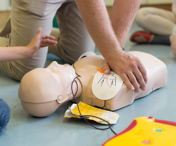 First aid cardiopulmonary resuscitation course using automated external defibrillator device, AED.