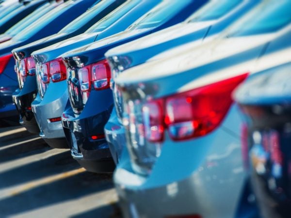 Parked Cars on a Lot. Row of New Cars on the Car Dealer Parking Lot. Cars Market Theme.
** Note: Shallow depth of field