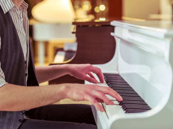 Close up of man playing the piano
