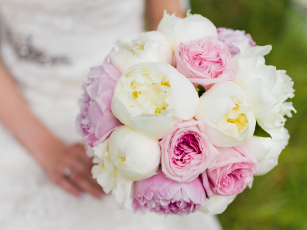Close up of bride holding boquet