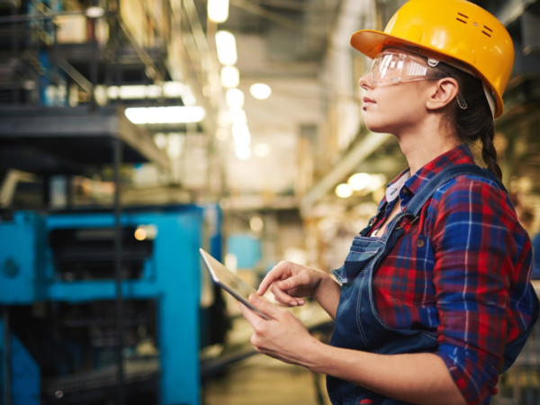 woman hard hat inventory clipboard
